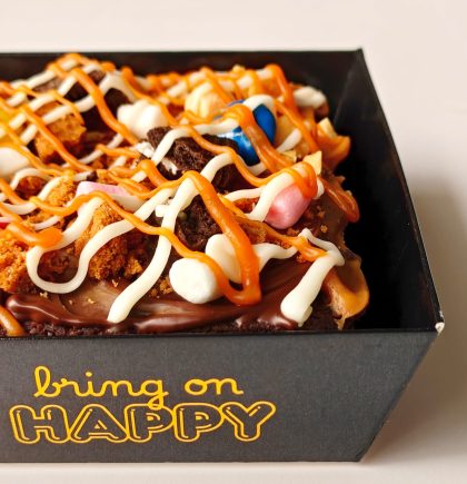 Loaded Brownie Rush with Nutella, peanut butter, Oreos, M&Ms, marshmallows, Biscoff, walnuts, white chocolate, and caramel sauce