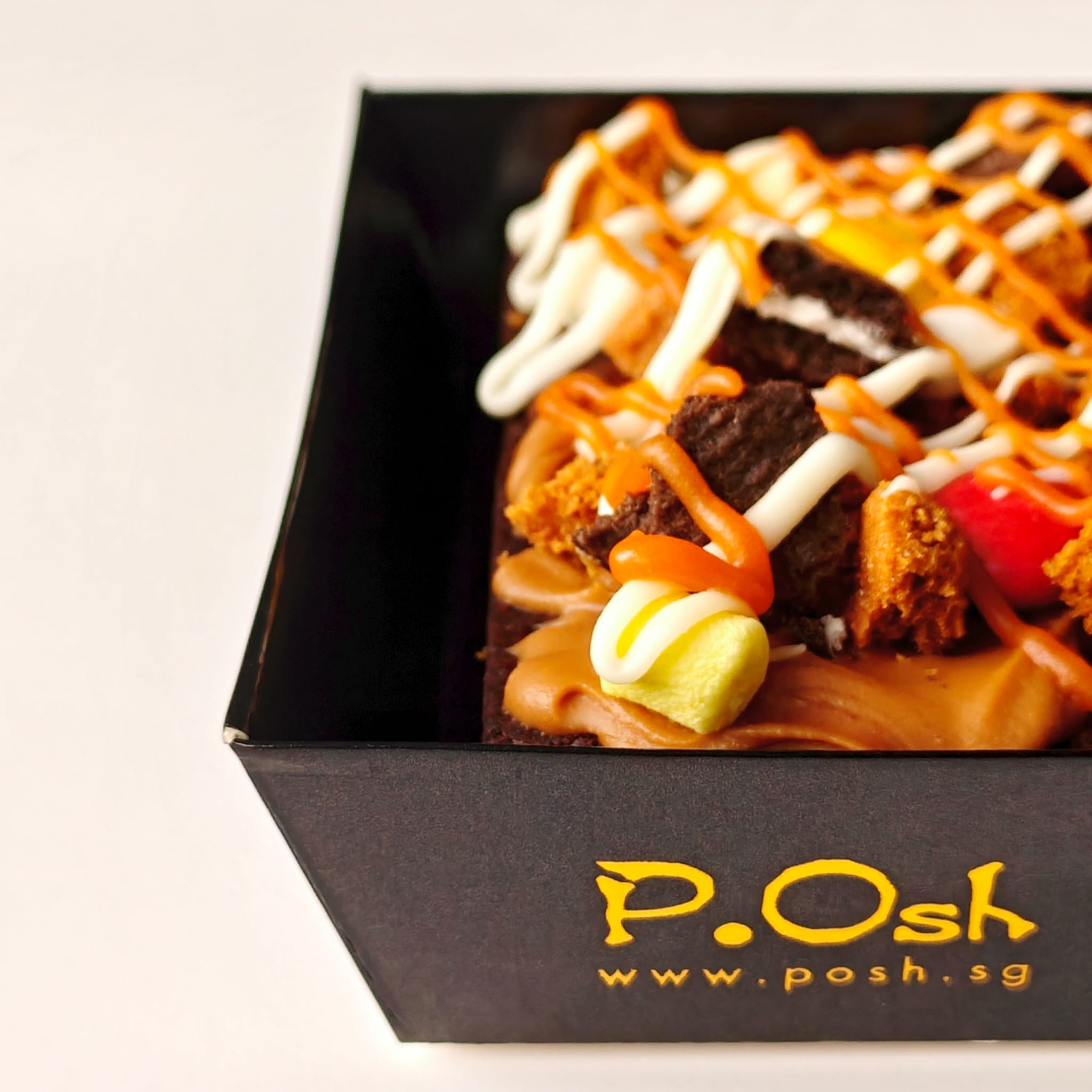 Loaded Brownie Rush with Nutella, peanut butter, Oreos, M&Ms, marshmallows, Biscoff, walnuts, white chocolate, and caramel sauce